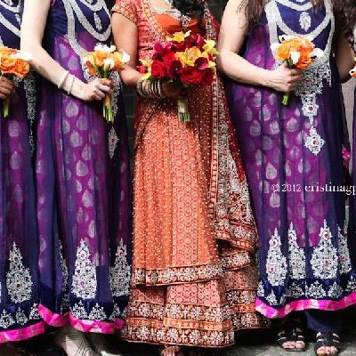 purple bridesmaid dresses and bride on wedding day