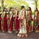 Indian bridesmaids in green and red sarees