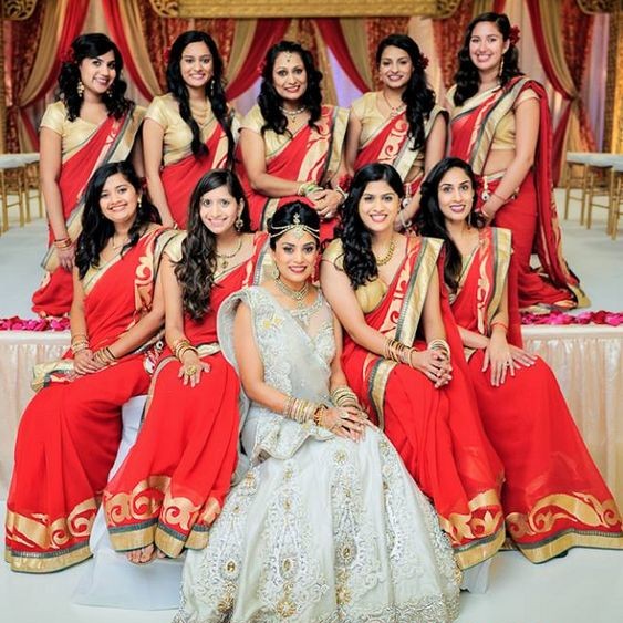 Indian bridesmaids in red sarees