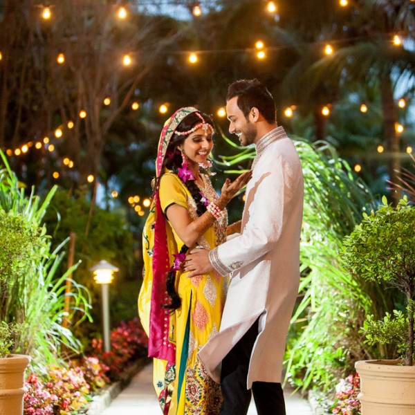 Pakistani bride and groom at mehendi night